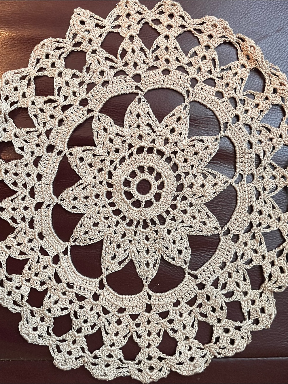 Intricate lace crochet doily
